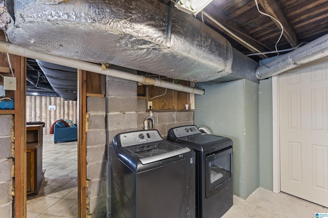 laundry area featuring independent washer and dryer