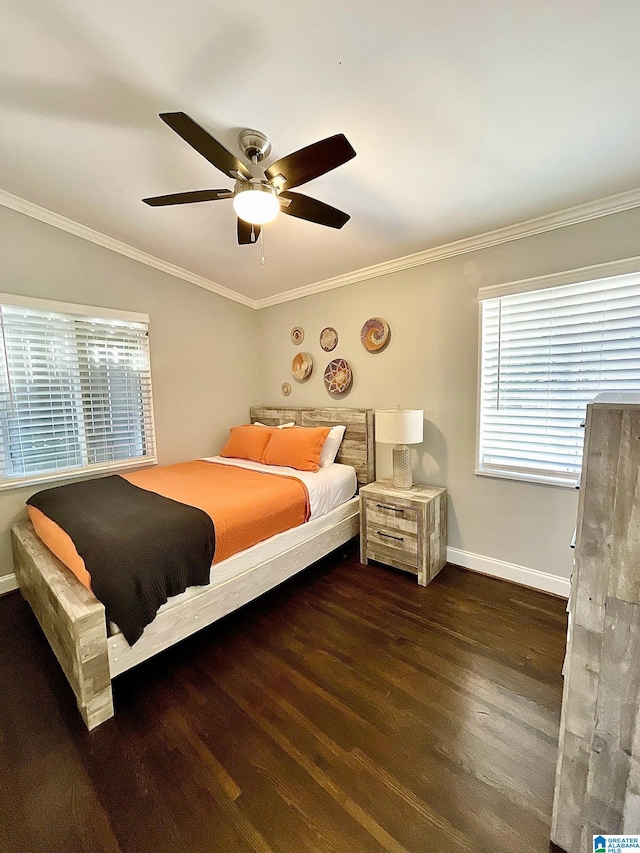 bedroom with crown molding, ceiling fan, and dark hardwood / wood-style flooring