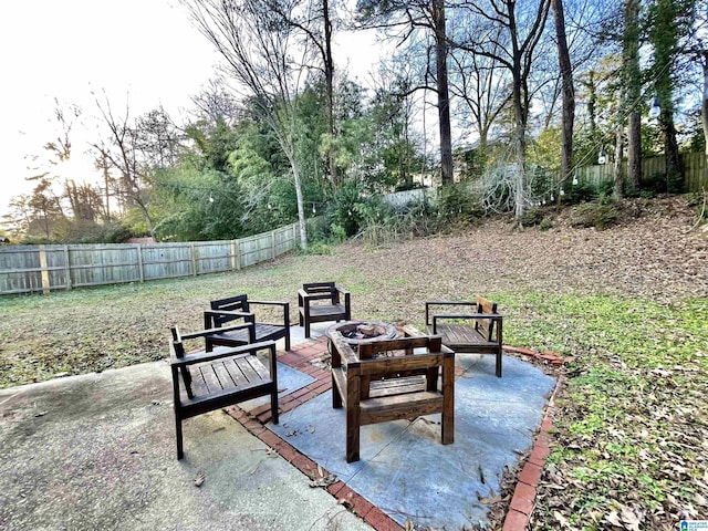 view of patio featuring a fire pit