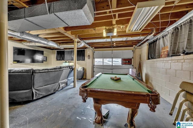 rec room featuring billiards and concrete flooring