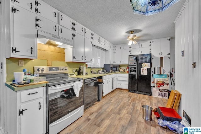 kitchen featuring light wood-type flooring, white cabinets, ceiling fan, black appliances, and a textured ceiling