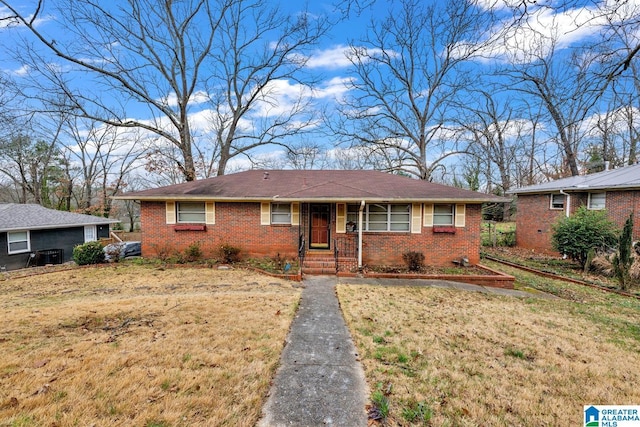 ranch-style house with a front yard