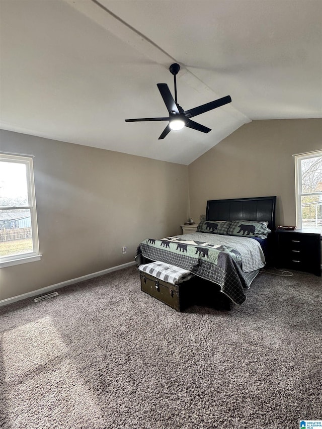 carpeted bedroom featuring ceiling fan and lofted ceiling