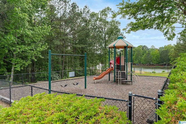 view of play area with a water view