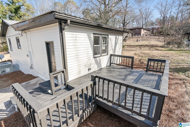 wooden deck with central AC unit