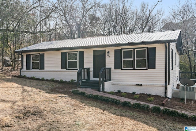 single story home with a front yard