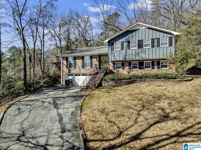 split level home featuring a garage