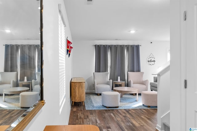 sitting room with dark hardwood / wood-style floors