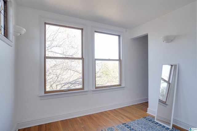 spare room featuring hardwood / wood-style flooring