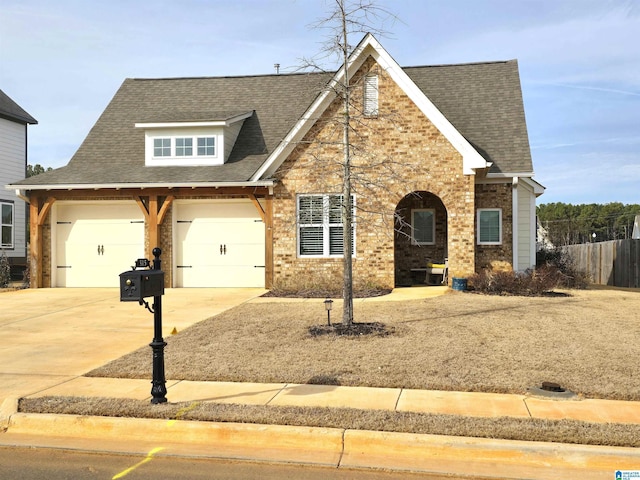 view of front of property with a garage