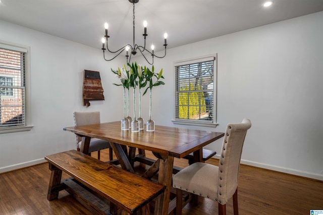 dining room with dark hardwood / wood-style floors