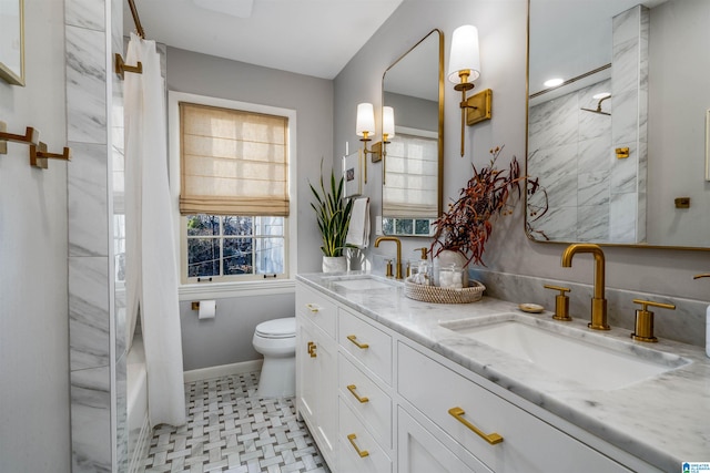 full bathroom featuring vanity, toilet, and shower / bath combo with shower curtain