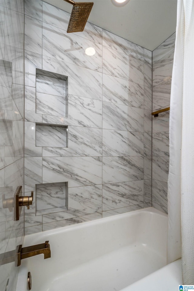 bathroom with shower / bath combo