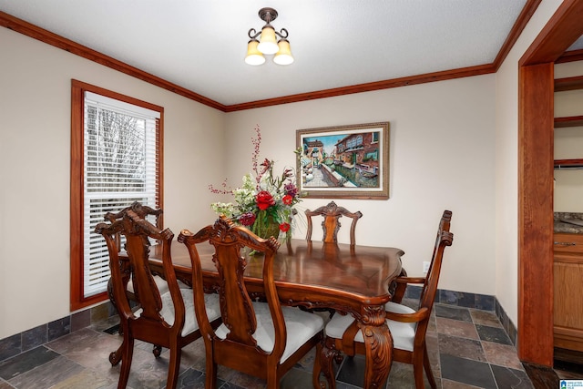 dining area with ornamental molding