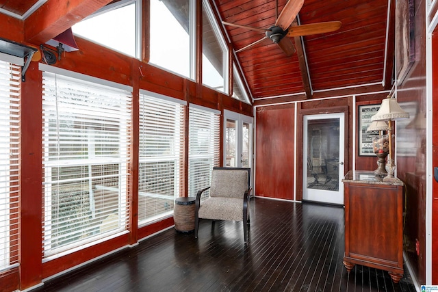 unfurnished sunroom with wood ceiling, ceiling fan, and vaulted ceiling with beams