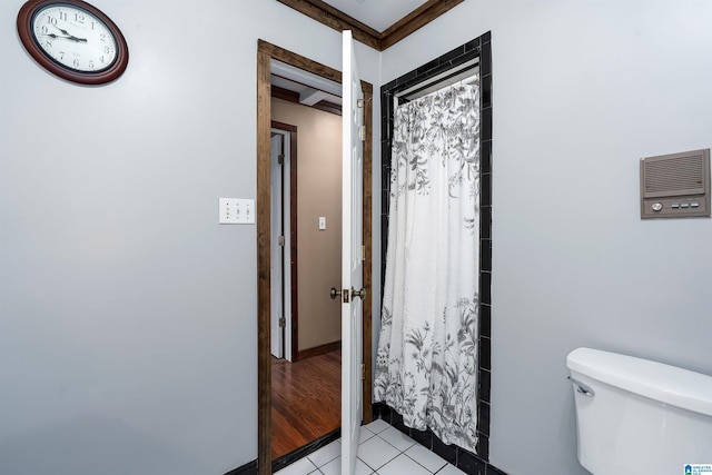 bathroom featuring tile patterned floors and toilet