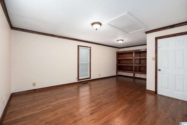 unfurnished room with crown molding and dark hardwood / wood-style flooring