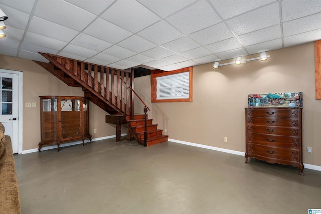 interior space featuring a paneled ceiling