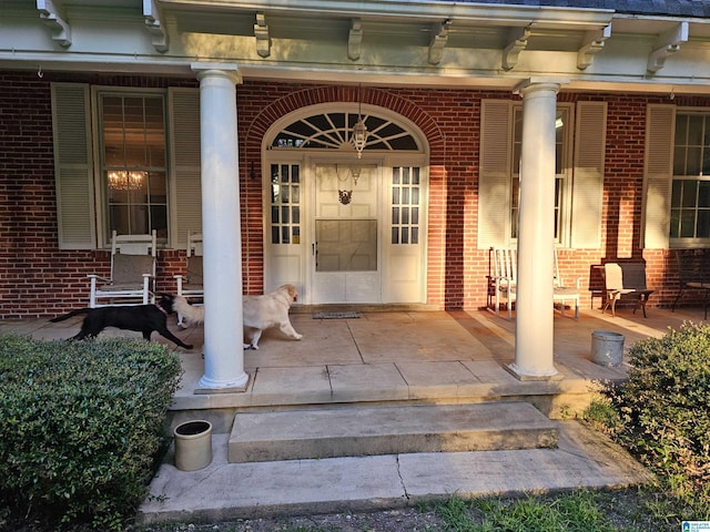 property entrance featuring covered porch