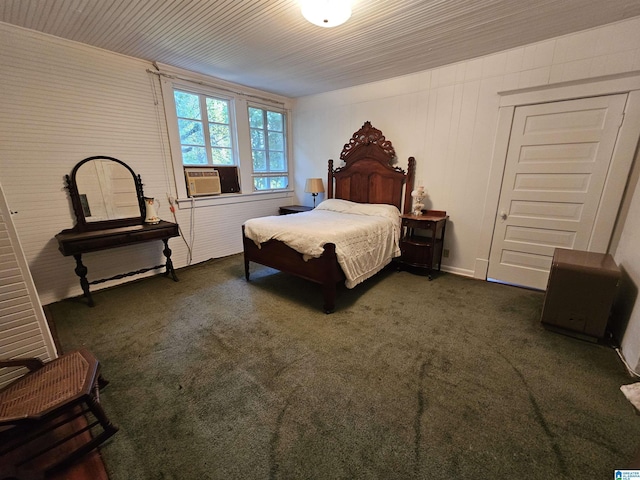 bedroom featuring cooling unit and dark carpet