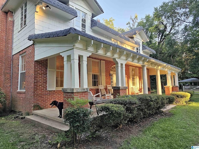 view of home's exterior with a porch