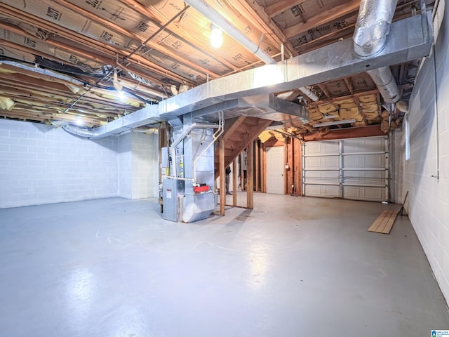 basement featuring heating unit