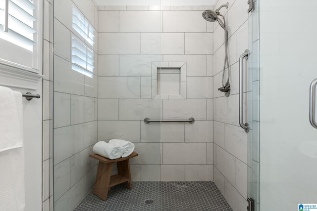 bathroom featuring an enclosed shower