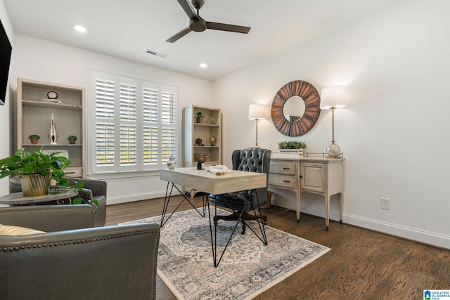 office featuring dark hardwood / wood-style floors and ceiling fan