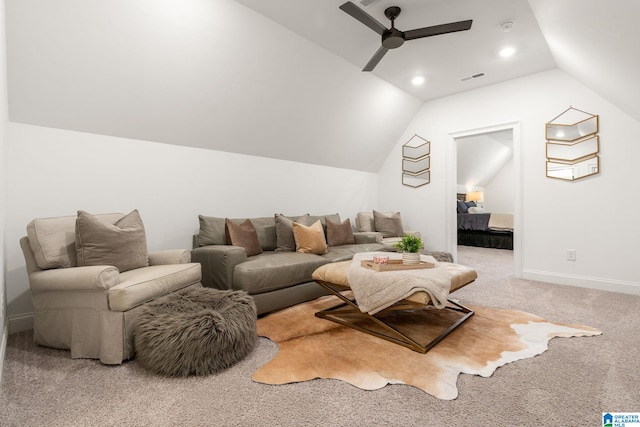 carpeted cinema featuring lofted ceiling and ceiling fan