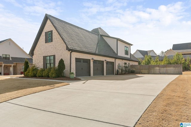 view of property exterior featuring a garage