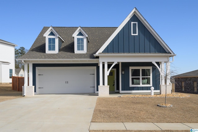 view of front of house with a garage and covered porch