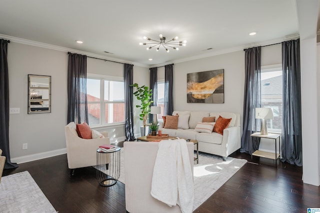 living room with crown molding, dark wood-type flooring, and a chandelier