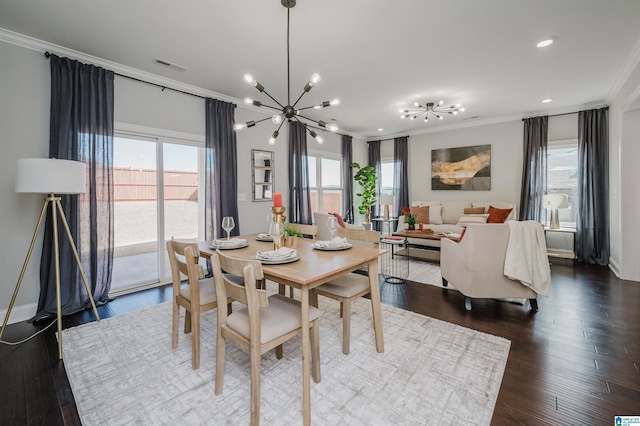 dining space with ornamental molding, dark hardwood / wood-style floors, and a notable chandelier