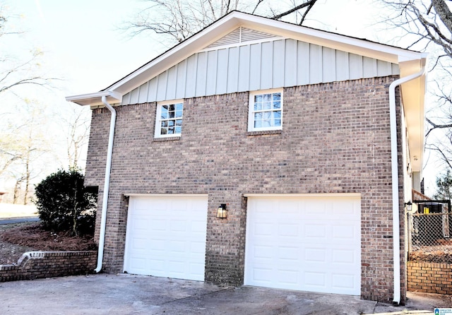 view of property exterior with a garage