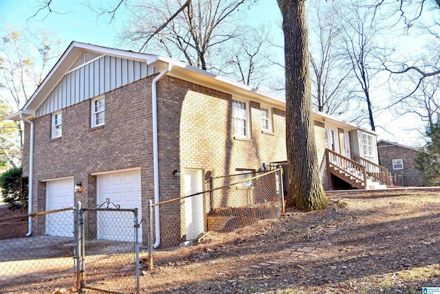 view of side of property with a garage