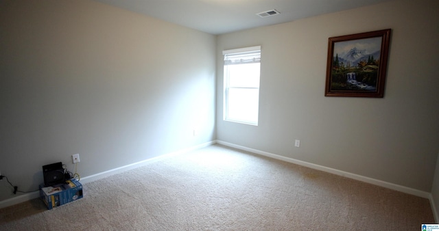 view of carpeted spare room