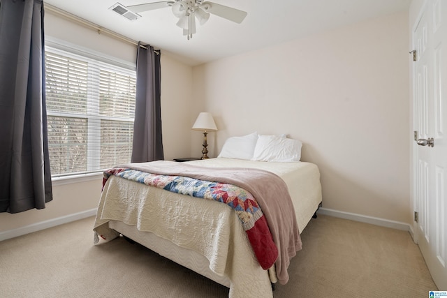 carpeted bedroom featuring ceiling fan