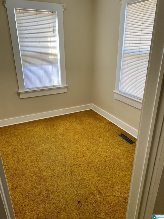 view of carpeted spare room