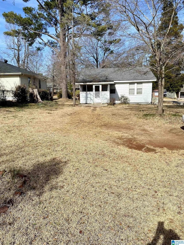 exterior space with a front yard