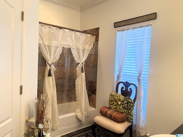 bathroom featuring ornamental molding and shower / bathtub combination with curtain