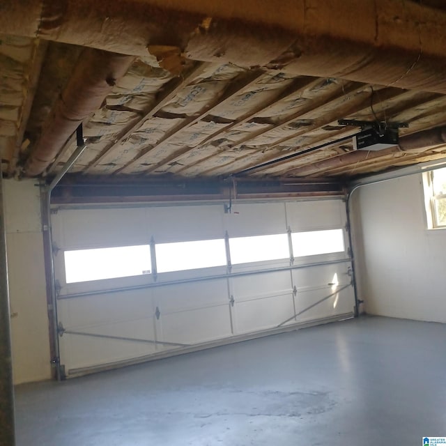 garage featuring a garage door opener