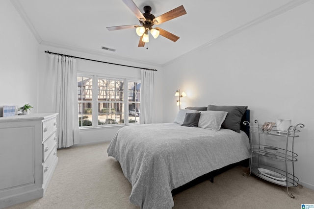 bedroom featuring ceiling fan, light colored carpet, and ornamental molding