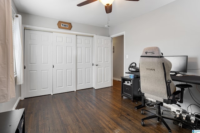 office area with ceiling fan and dark hardwood / wood-style floors