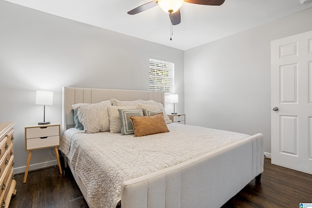 bedroom featuring dark hardwood / wood-style floors and ceiling fan