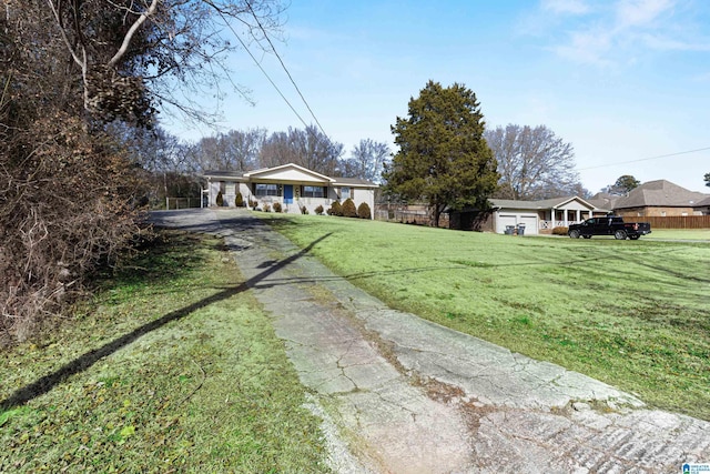 view of front of home featuring a front lawn and a carport