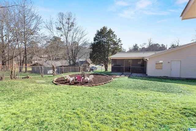 view of yard with a sunroom