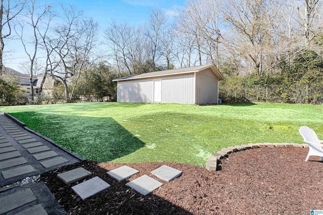 view of yard with an outdoor structure