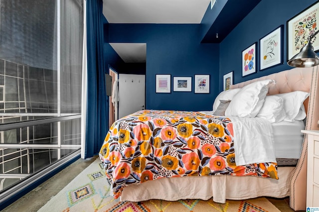 bedroom with concrete floors