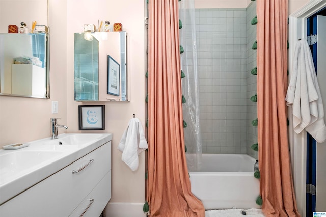 bathroom with vanity and shower / bath combo