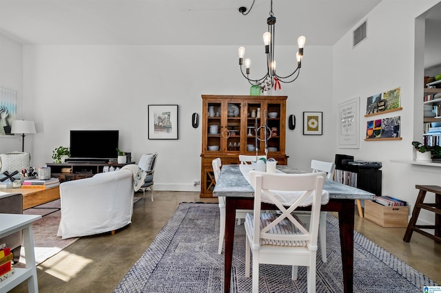 dining area featuring a chandelier